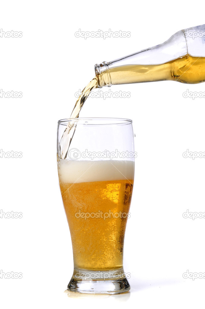 Beer being pour on a glass