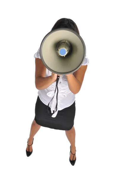 Young businesswoman with megaphone — Stock Photo, Image