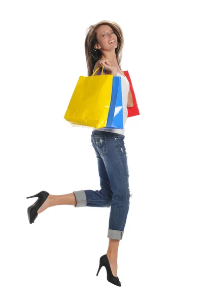 Mujer joven con bolsas de compras — Foto de Stock