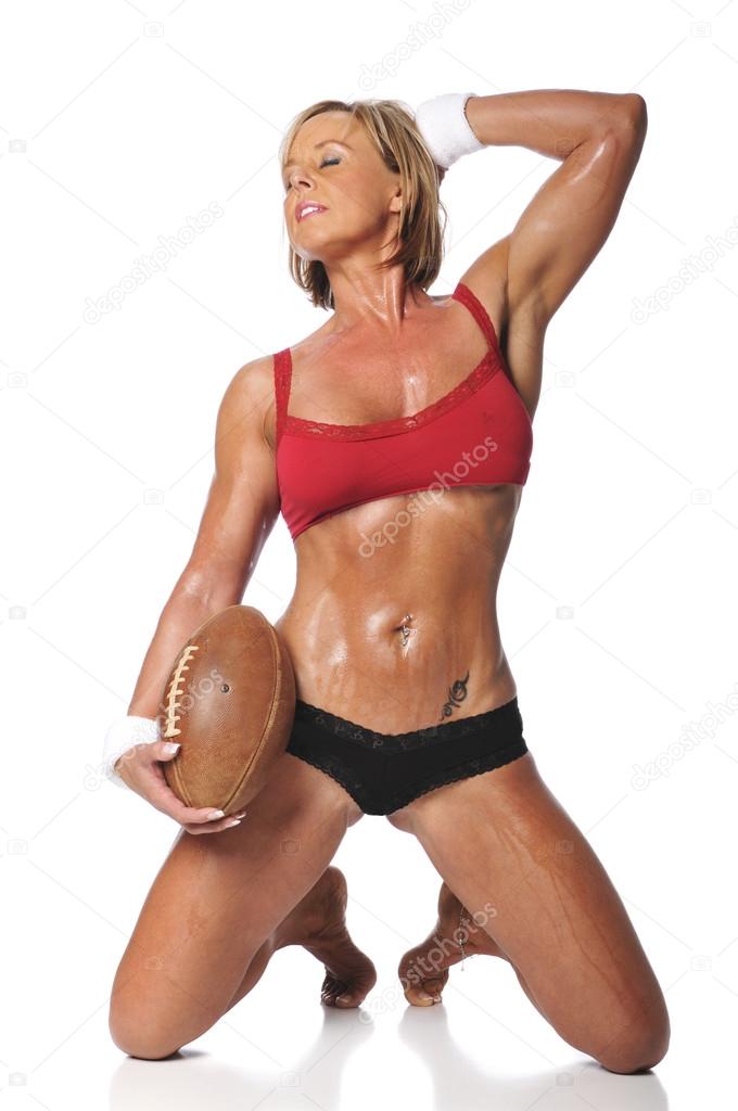 Woman holding a football