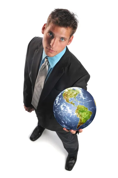 Geschäftsmann, der den Planeten Erde hält — Stockfoto