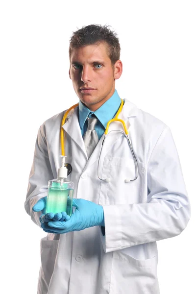 Médico segurando gel higienizador mão — Fotografia de Stock