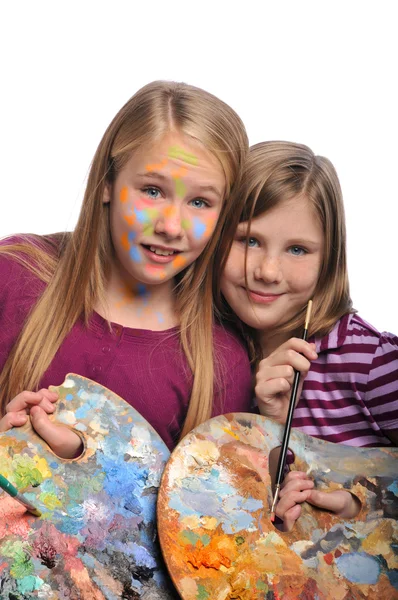 Jonge meisjes doen gezicht schilderen — Stockfoto