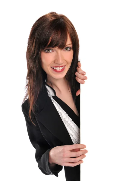 Young businesswoman holding a sign — Stock Photo, Image