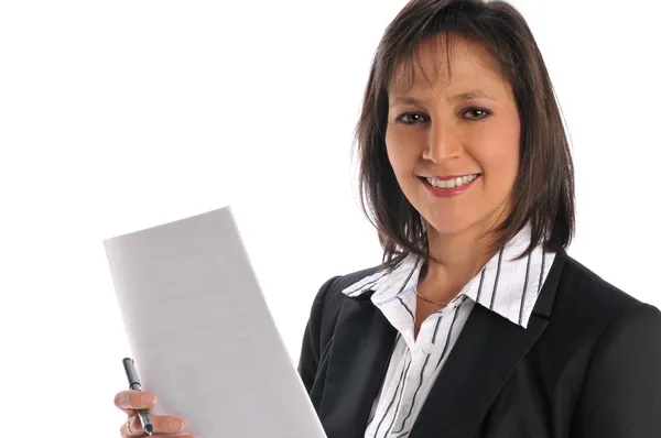 Femme d'affaires tenant un stylo et du papier — Photo
