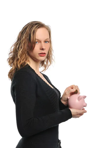 Woman with coin and piggy bank — Stock Photo, Image