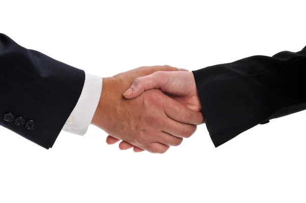 Handshake between a businessman and a businesswoman Royalty Free Stock Photos