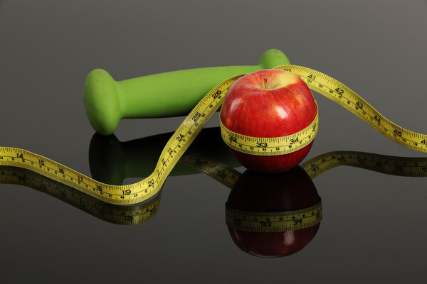 Red Apple, weight and measurement tape