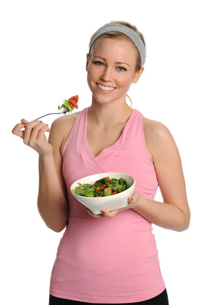 Jovem loira segurando uma tigela de salada — Fotografia de Stock