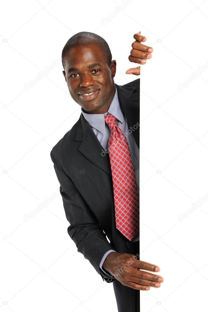 Young African American Businessman holding a blank sign