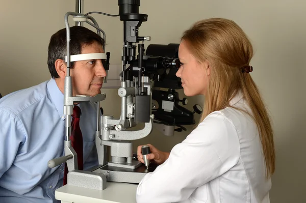 Young Eye Doctor with her patient — Stock Photo, Image