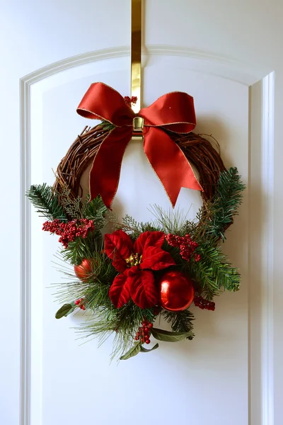 Christmas Decoration by a door — Stock Photo, Image