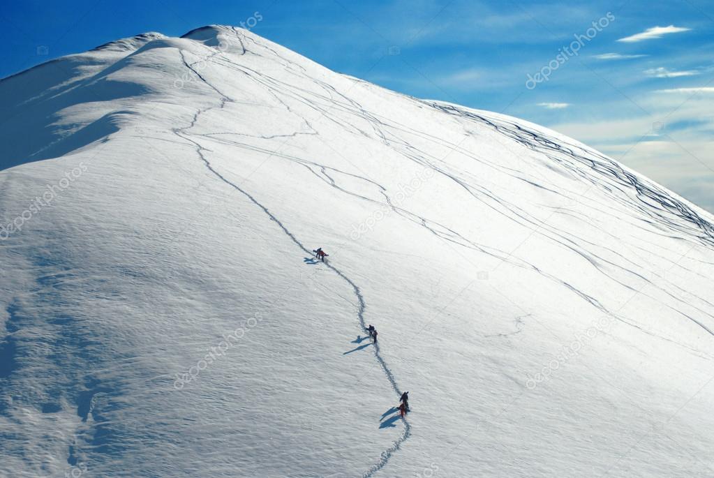 Alpinists climbing a mountain