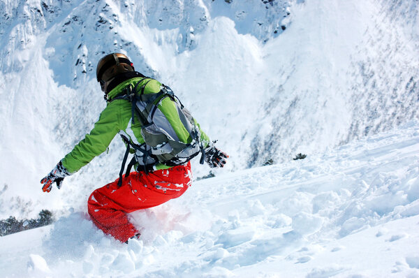 Snowboarder in deep powder