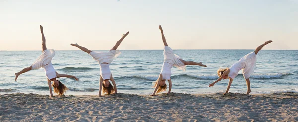 Sexy girl jumping on the beach — Stock Photo, Image