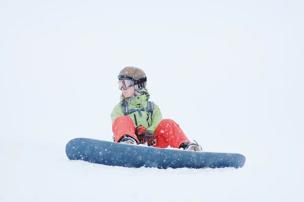 Retrato de uma snowboarder fêmea — Fotografia de Stock