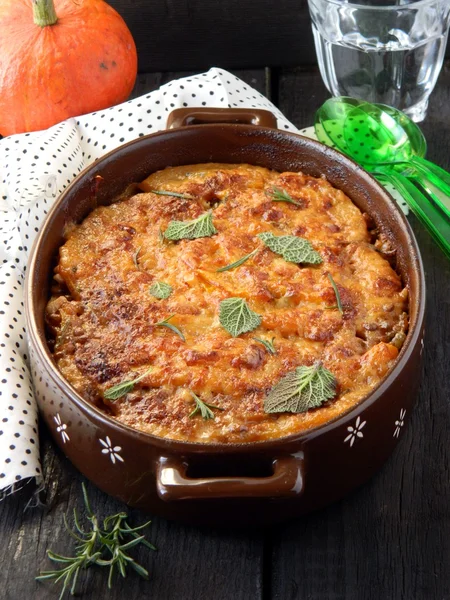 Appetizing dish on a wooden table — Stock Photo, Image