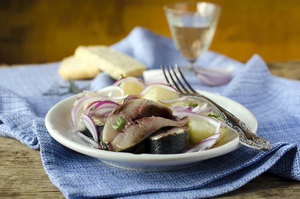 Salted herring with boiled potatoes