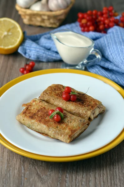 Pancakes with stuffing and berries — Stock Photo, Image