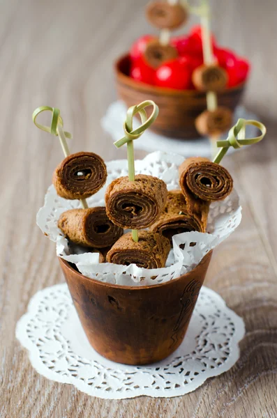 Schokoladenteig auf einem Stock — Stockfoto