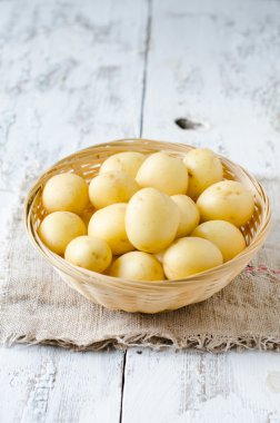 Fresh young potatoes in a basket