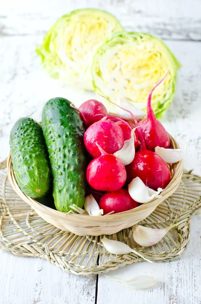 Fresh vegetables : radishes, cabbage , cucumbers and garlic — Stock Photo, Image