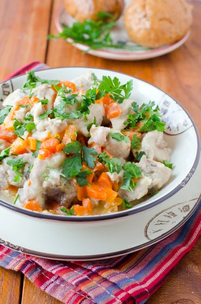 Rabbit stew with vegetables and sour cream — Stock Photo, Image