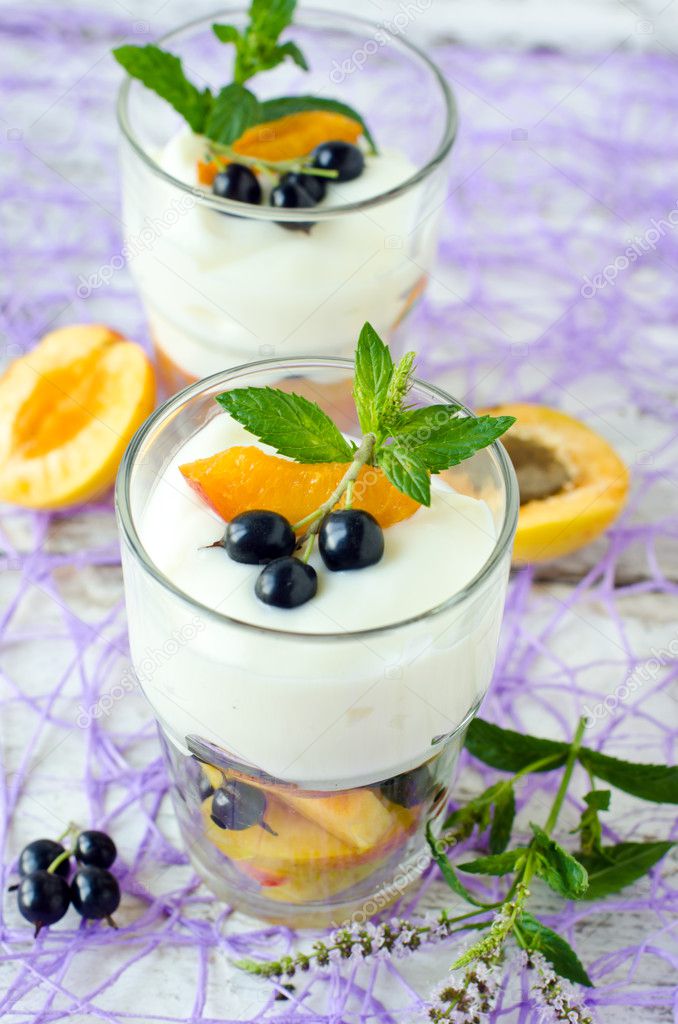 Cream dessert with fruit and berries