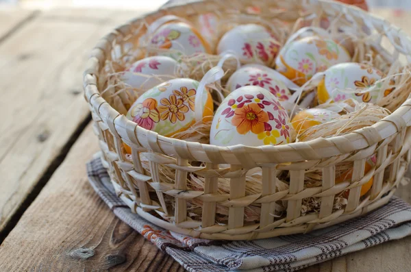 Painted Easter eggs on a wooden table — Stock Photo, Image