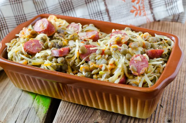 Cabbage stew with lentils and sausages — Stock Photo, Image