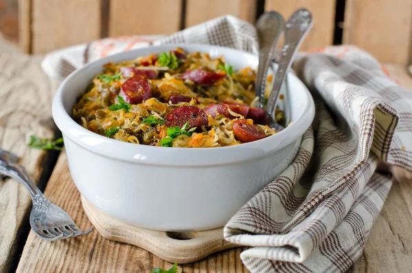 Cabbage stew with lentils and sausages — Stock Photo, Image