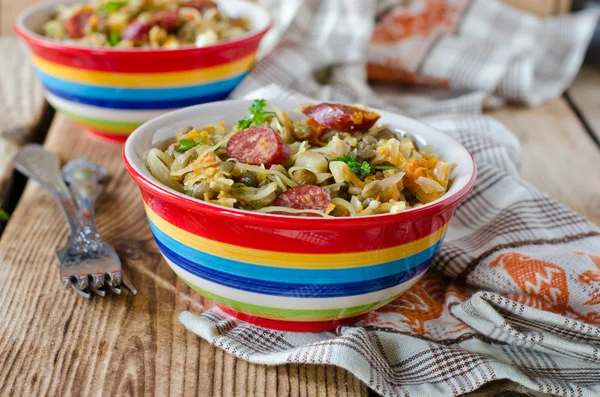 Cabbage stew with lentils and sausages — Stock Photo, Image