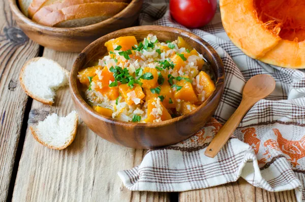Pumpkin stew with rice and meat — Stock Photo, Image