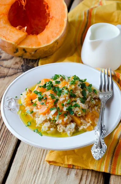 Pumpkin stew with rice and meat — Stock Photo, Image