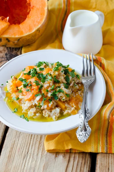 Pumpkin stew with rice and meat — Stock Photo, Image