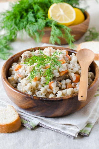 Barley porridge with meat and vegetables — Stock Photo, Image