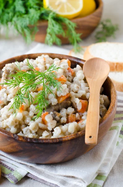 Barley porridge with meat and vegetables — Stock Photo, Image