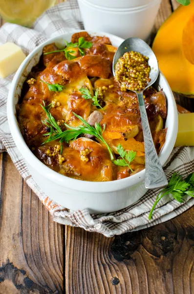 Pumpkin baked with cheese and grain mustard — Stock Image Pumpkin baked with cheese and grain mustard Royalty Free Stock Images
