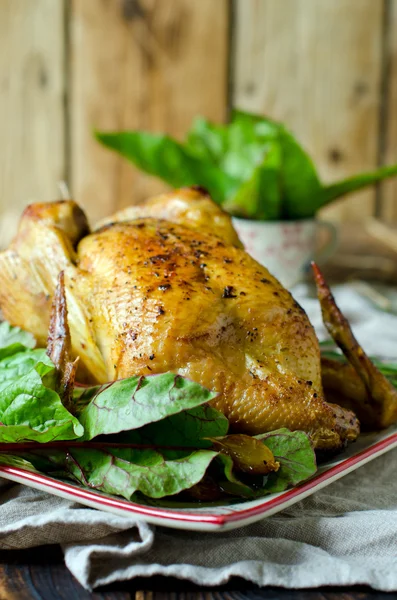 Frango assado com especiarias e alecrim — Fotografia de Stock