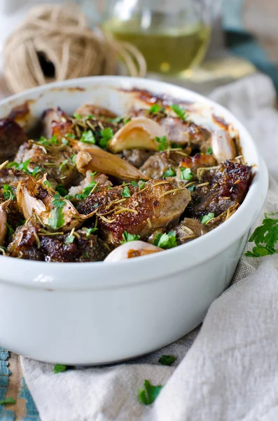 Meat baked with garlic — Stock Photo, Image