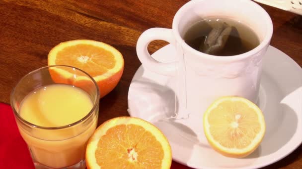 Orange juice, tea — Stock Video