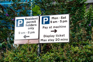 Sign of Parking restrictions in England UK clipart