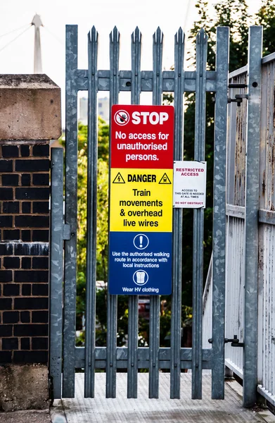 Warning sign restricted access on train station in England UK — Stock Photo, Image