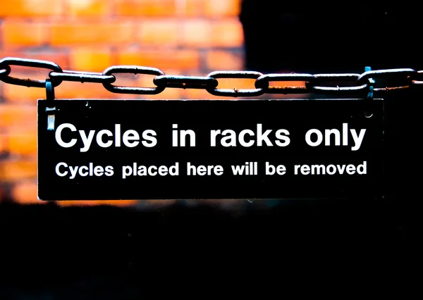 Warning sign for students in a college for cycles in racks only — Stock Photo, Image