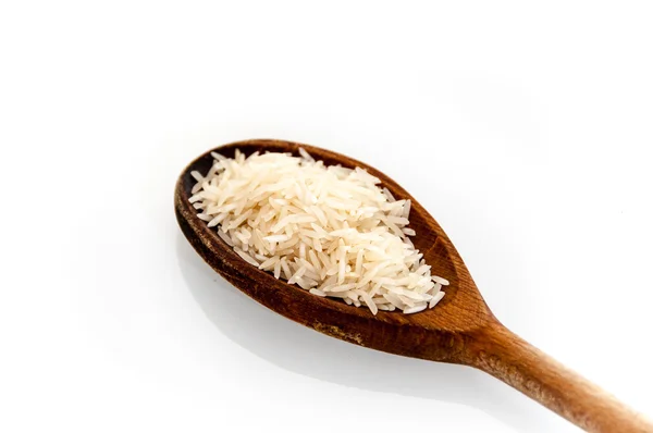 Wooden spoon with rice isolated on white background — Stock Photo, Image