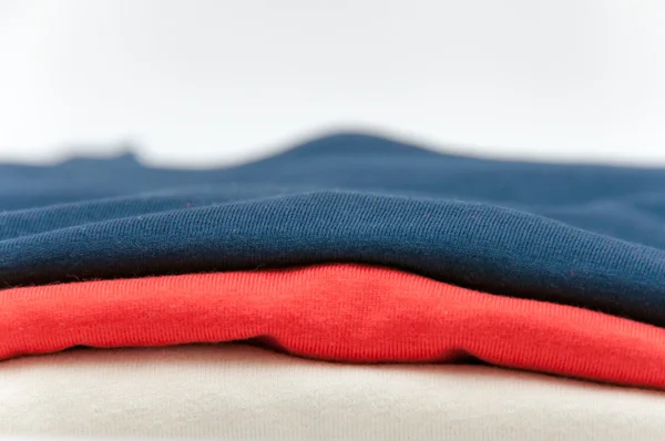 Close up of folded T Shirts — Stock Photo, Image