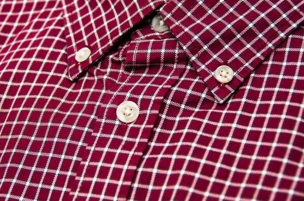 Stylish image of collar of chequered shirt