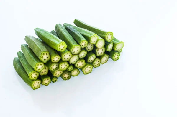 Freshly cut okra, lady finger on white background — Stock Photo, Image