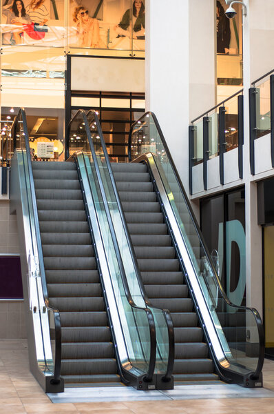 Escalator in a shopping mall, UK