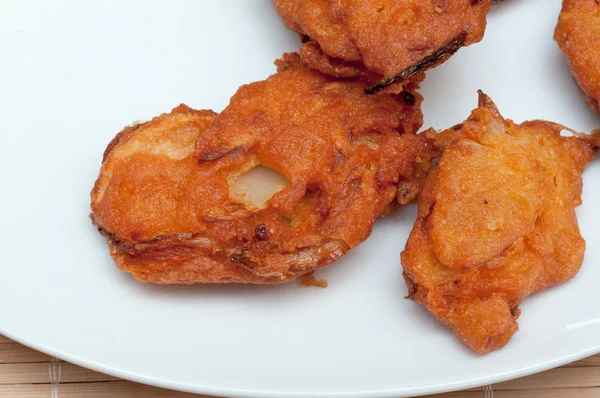 Pakora on a white plate close up — Stock Photo, Image